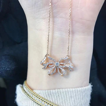 Ornament Jeweled Pendant Niche Bow Necklace